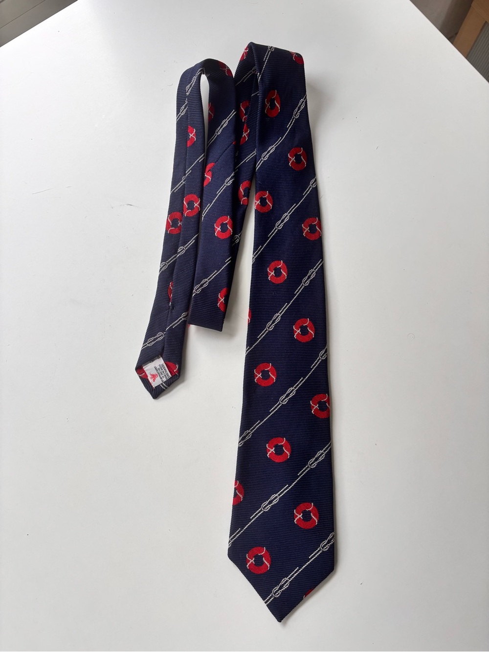Turnbull & Asser Navy Tie with Red Lifesaver and Silver Chain Motif